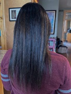 Long, sleek, straight dark hair