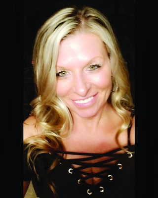 Nichole, stylist at Off The Top Hairstyling